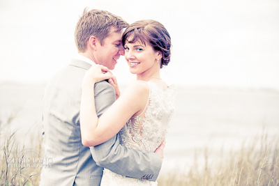 bride and groom in a embrace on Bald Head Island - Wedding Picture Ideas - Wedding Photography