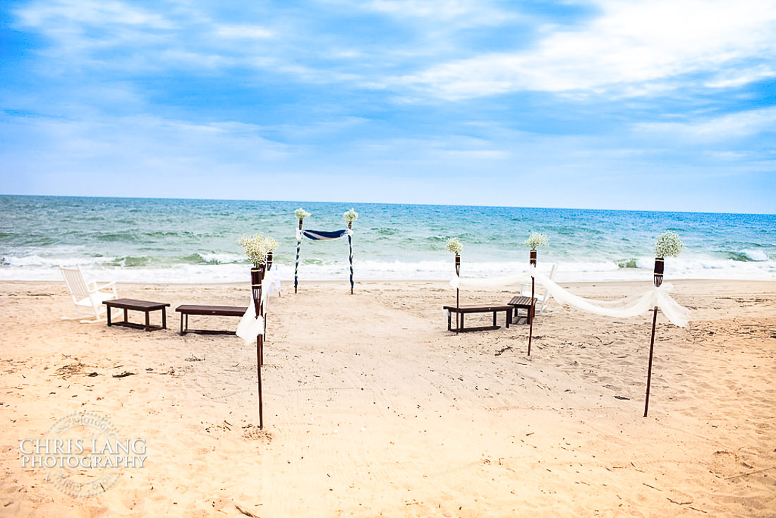 Bald Head Beach Wedding - wedding ceremony set-ip in the sand -wedding photography