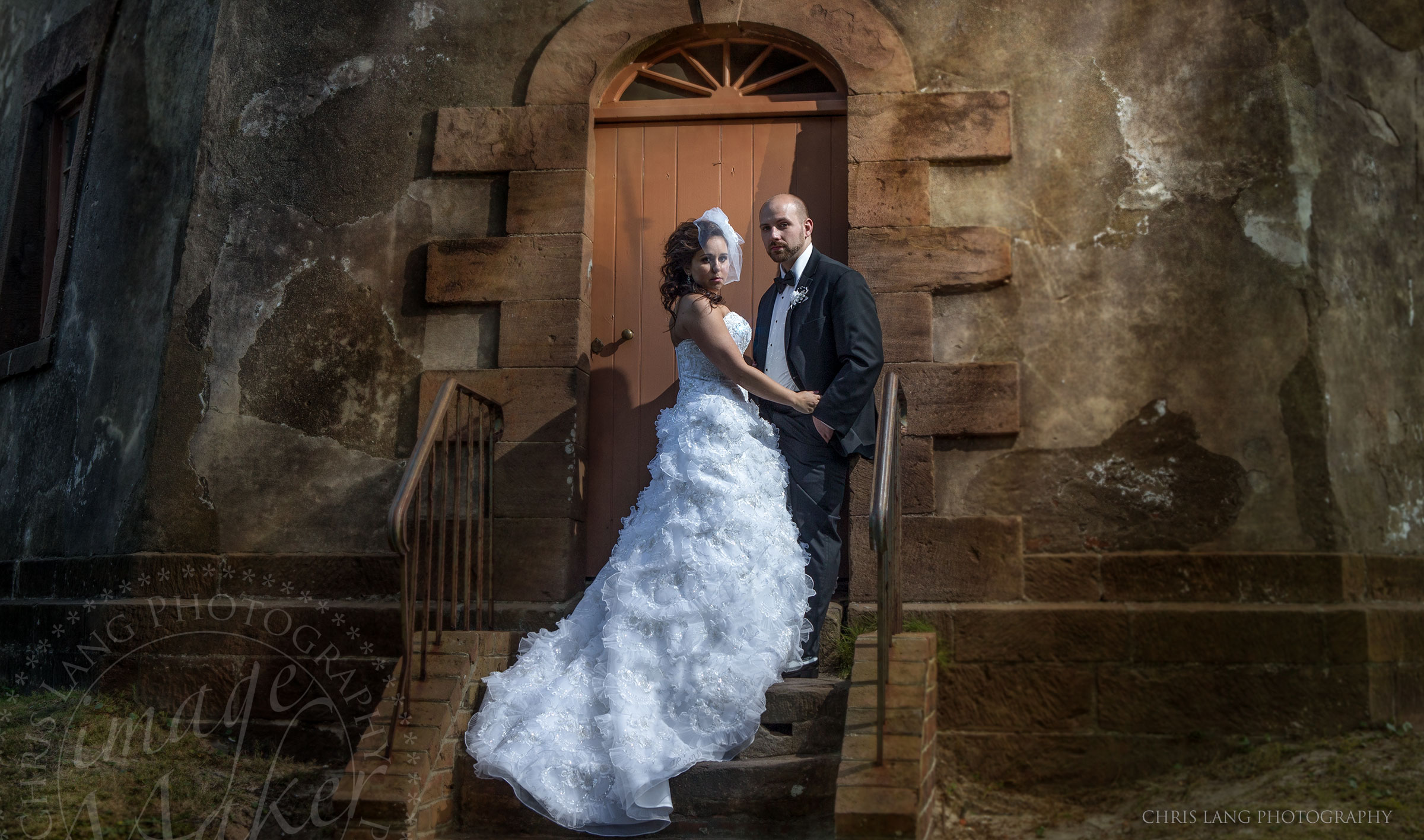 Old Baldy Lighthouse  - Wedding Photography - Wedding image of bride and grromon the steps of old baldy - Bald Head Island Photographers