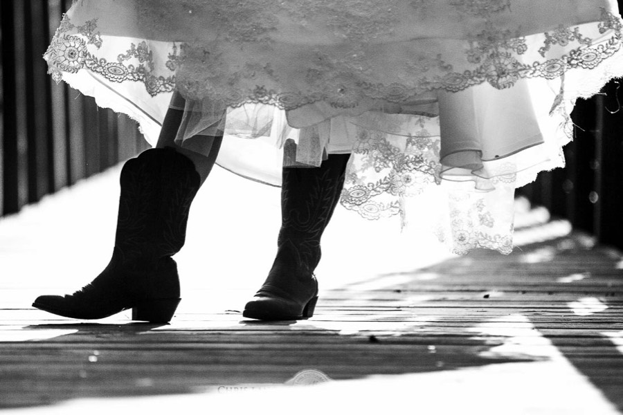 Fine-Art-Bridal-Photography-in-Black-and-White-Pictures-Ideas-and-Inspiration-Wilmington NC Wedding Photographers-Bride in wedding dress and cowboy boots