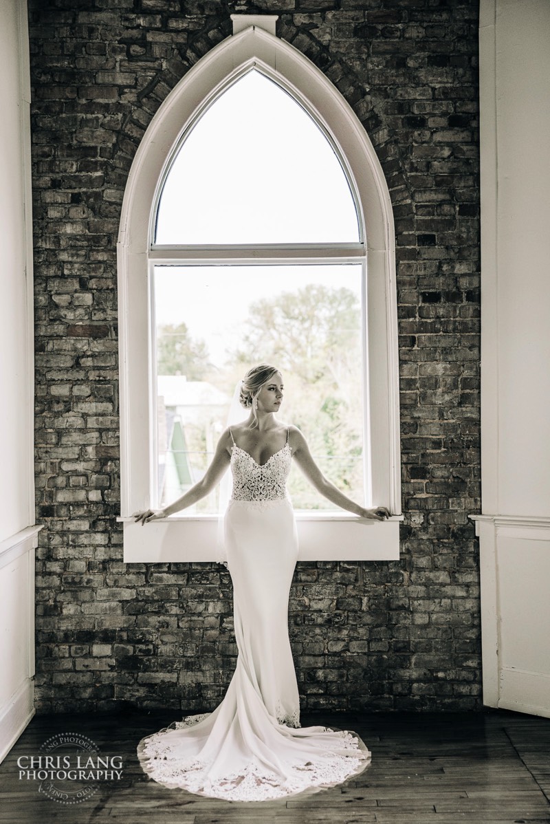 Right her wedding dress - arch windows - brooklyn arts center - weddings - wedding venue -  wedding photo - ideas - wilmington nc - chris lang photography 
