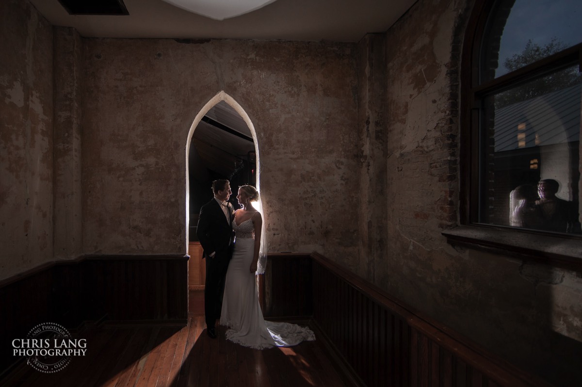Romantic picture of bride and groom inside the Brooklyn Arts Center - brooklyn arts center - weddings - wedding venue -  wedding photo - ideas - wilmington nc - chris lang photography 