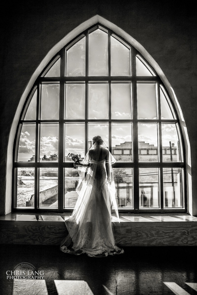 Bride in the cathedral window - bridal portrait - wedding bouquet - brooklyn arts center - weddings - wedding venue -  wedding photo - ideas - wilmington nc - chris lang photography 
