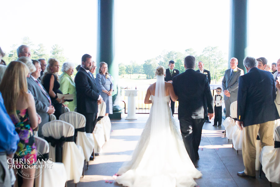 Dad walking daughter down the isle - Weddings on the vernada at River Landing Country Club - Wallace NC