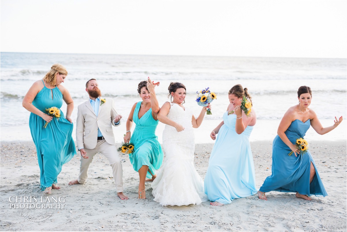 fun bridal party beach photo - bridal party photos - bridesmaids - groomsmen -  bridal party photography ideas - wilmington nc wedding photography