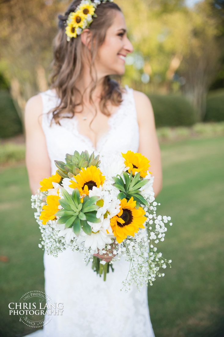 briide with sun flower boquet - brides - photos - wedding dress - bridal ideas - wedding day - wilmington nc wedding photography