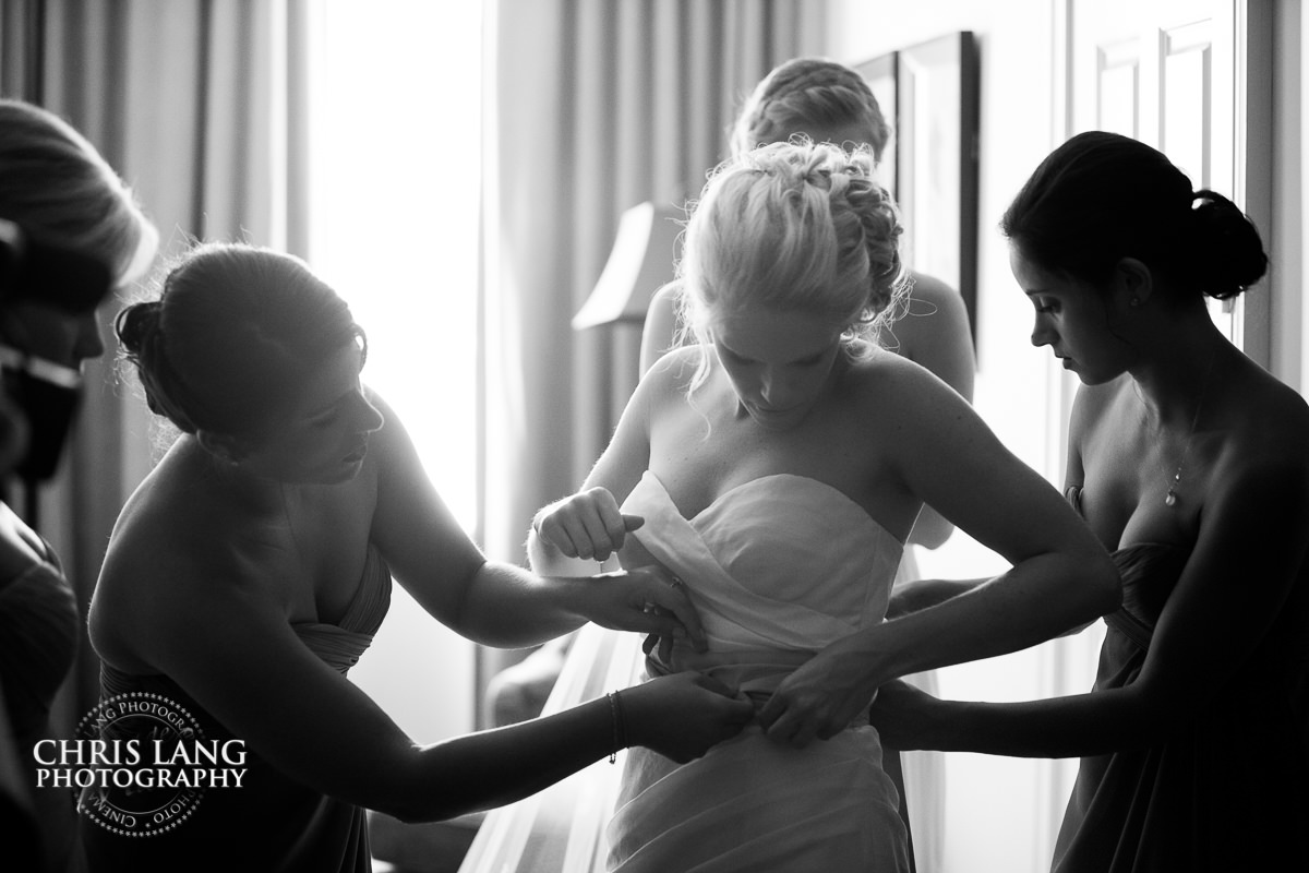 bride gettinginot wedding dress - wedding photojournalism