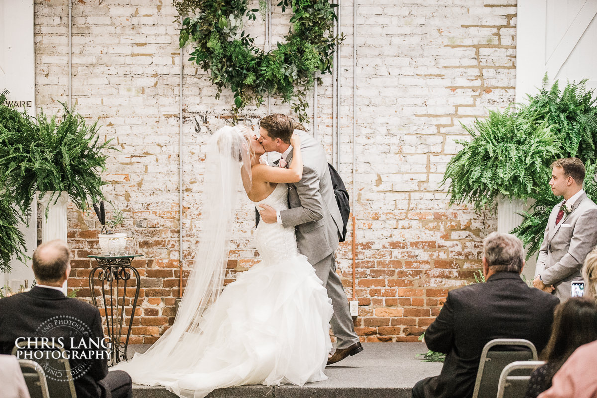 first kiss - Wedding ceremony photo - Wedding ceremonies - bride - groom - bridal party - wedding ceremony photography - ideas - Wilmington NC Wedding Photography