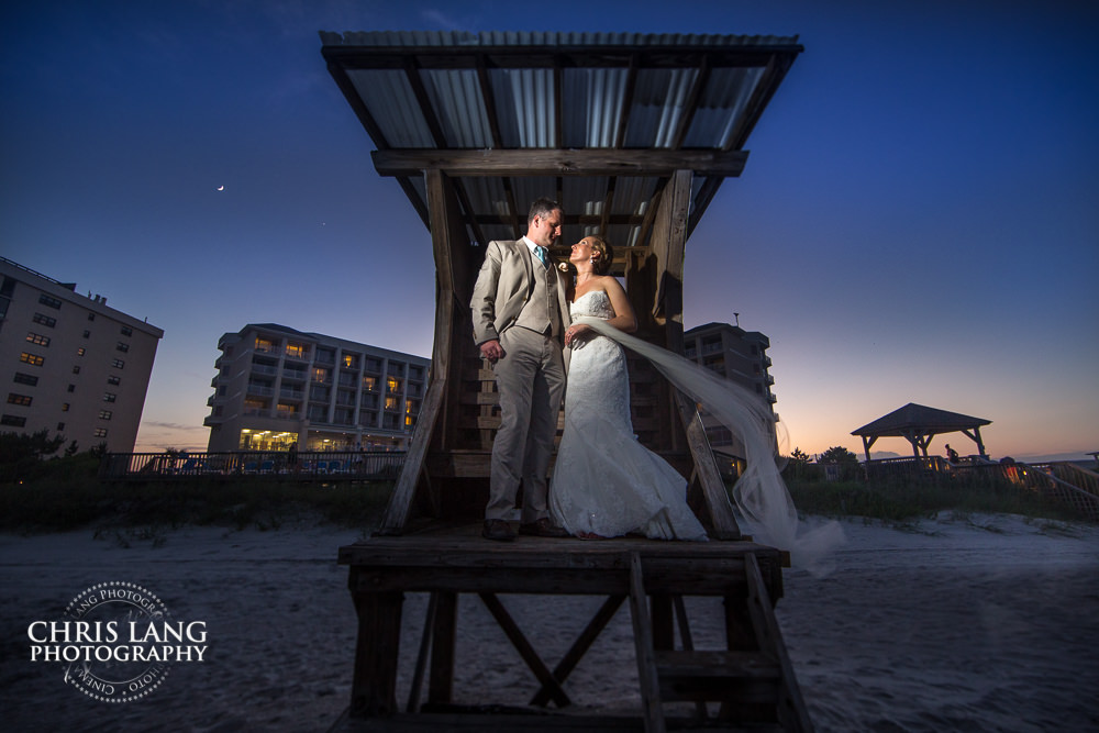 wrightsvile beach nc - Sunspree resort beach weddings - sunset wedding photo - the golden hour - bride & groom - wedding dress - sunset wedding photography - twlight on the beach