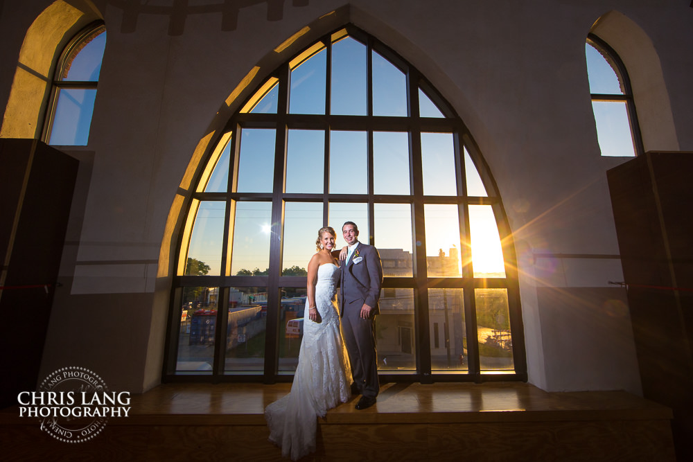 brooklynn arts center- wilmington wedding venues - sunset wedding photo - the golden hour - bride & groom - wedding dress - sunset wedding photography - twlight  -nc wedding photographers