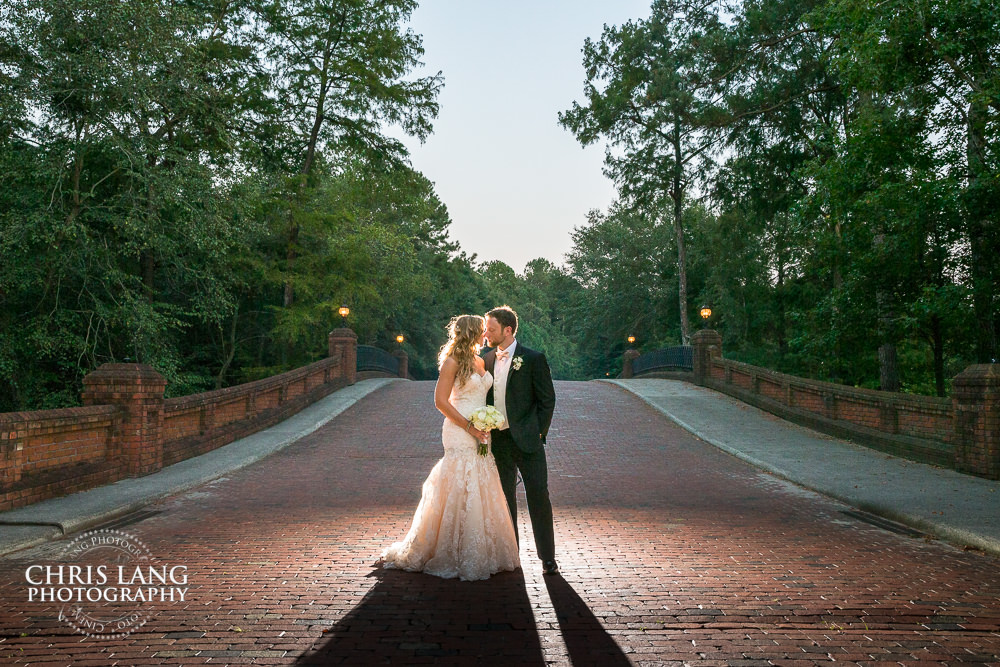 River Landing brick bridge - wallace nc - sunset wedding photo - the golden hour - bride & groom - wedding dress - sunset wedding photography - twlight 
