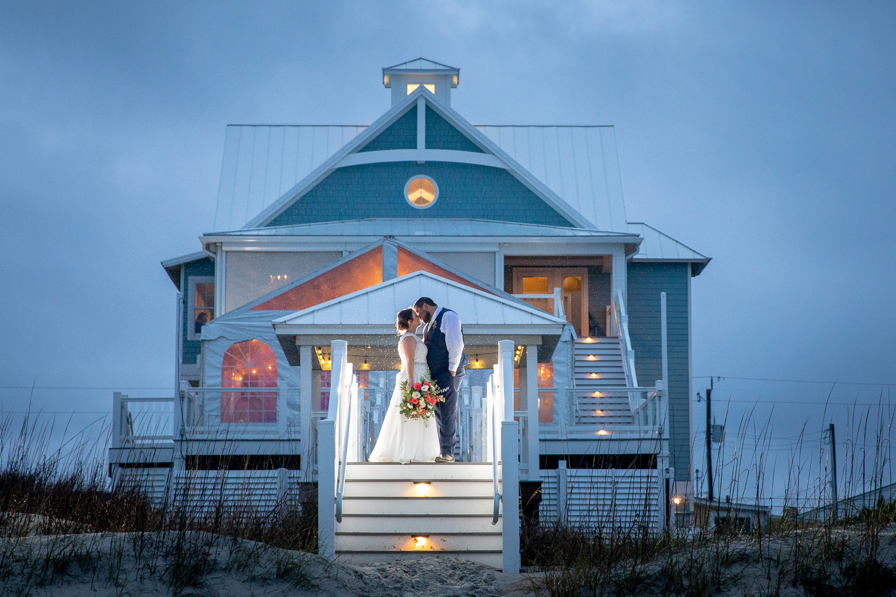 Beach house wedding -  sunset - twilight  - bride- groom - Wilmington NC Wedding Photographer - Wedding Photography - Sunset - Twilight - Colorful wedding photo style - Chris Lang Photography - Wedding Photo ideas 