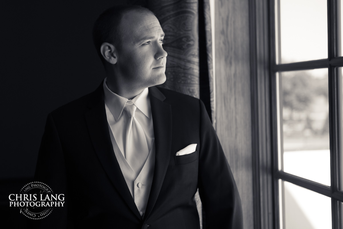 groom gettign ready - river landing -pre wedding photos - wedding photo ideas - getting ready wedding pictures - bride - groom - wedding dress - wilmington nc wedding photography  