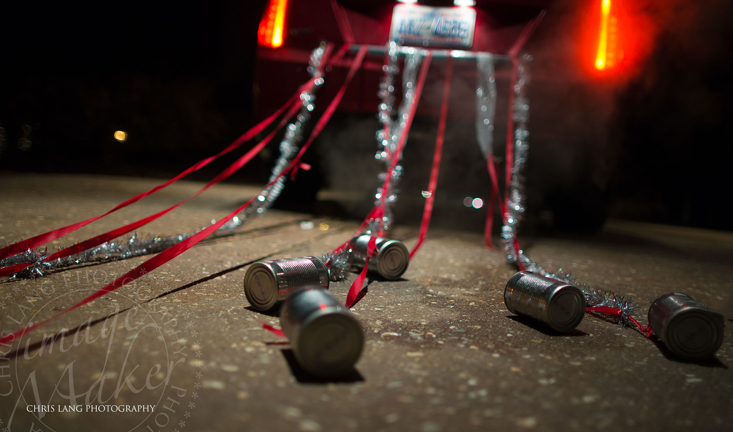 Wedding picture of cans behind the car on the bride and groom get away car. Wedding Pictures ideas